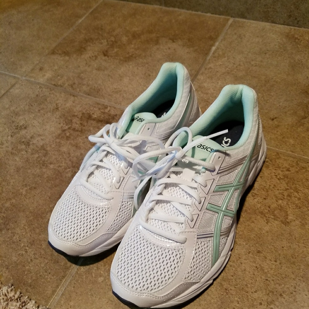 EUC ASIC GEL CONTENDO 4... worn for less than 1 hr